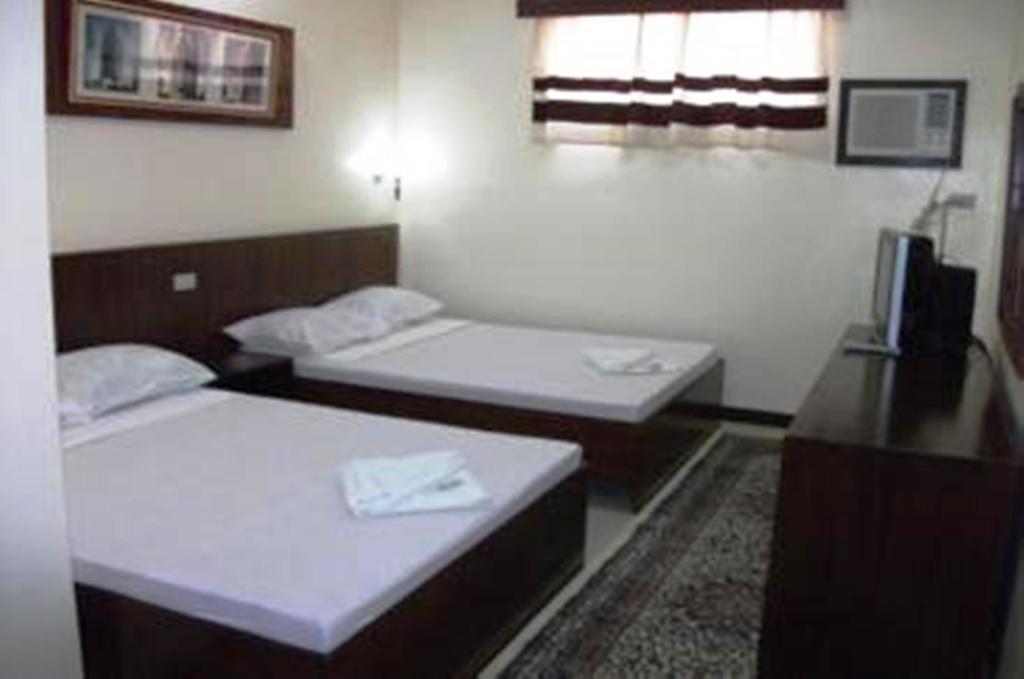 Bed and Breakfast Ysabelle Mansion Пуэрто-Принцеса Номер фото