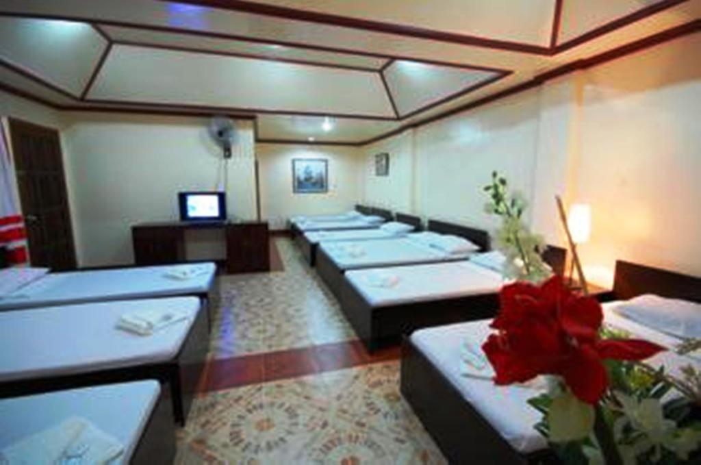 Bed and Breakfast Ysabelle Mansion Пуэрто-Принцеса Номер фото