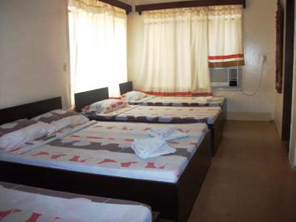 Bed and Breakfast Ysabelle Mansion Пуэрто-Принцеса Номер фото